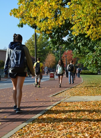 20131002 - Fall leaves surround students walking along Pollock Road - PSU backpack- cx