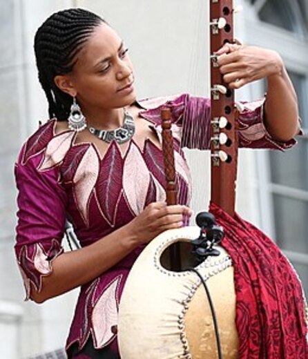 Aid for Trade Global Review 2017 – Day 1 Sona Jobarteh tuning kora.jpg