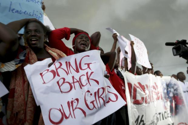 AFOLABI SOTUNDE / REUTERS Le 30 avril 2014, des femmes manifestent à Abuja, la capitale du Nigeria, pour réclamer le retour des 219 lycéennes enlevées par Boko Haram à Chibok.