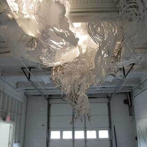 Mia Pearlman’s site specific cut paper installation