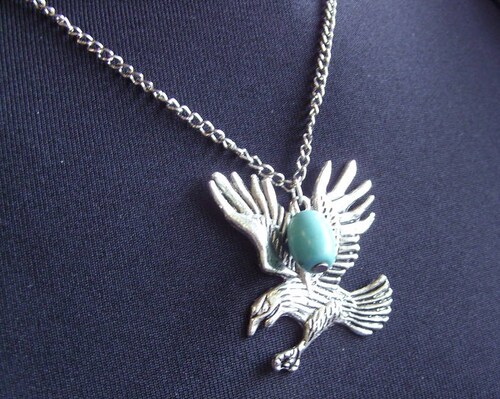 collier aigle argenté avec sa turquoise