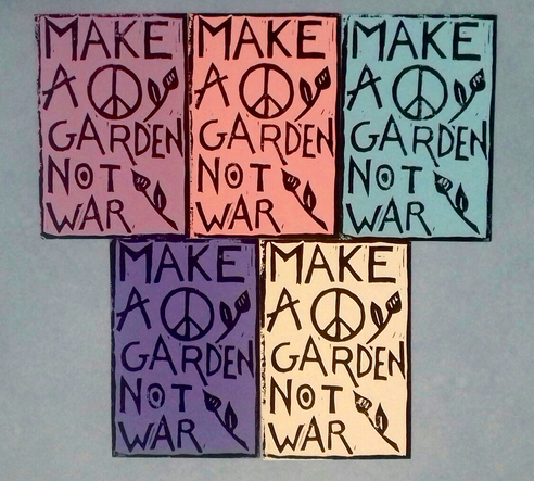 Cartes postales: "Make a peaceful garden, not war"