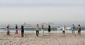 rainbow hula hoop beach sand sea