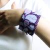 Bracelet tissé de perles violet et mauve 35€