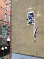 Naked Man Hanging From Window, 2006 - Banksy Explained