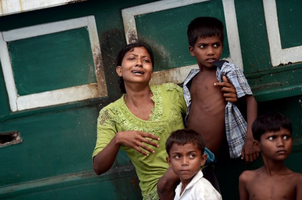 Des boat-people rohingyas de Birmanie dans un bateau au large de la Thaïlande, le 14 mai 2015 (AFP / Christophe Archambault) Des boat-people rohingyas de Birmanie dans un bateau au large de la Thaïlande, le 14 mai 2015 (AFP / Christophe Archambault)
