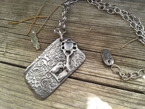 collier " carnet secret " en acier -3- finitions et montage