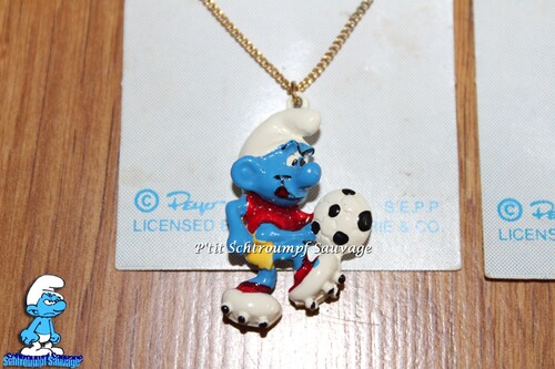 Chaînes avec pendentif métallique Schtroumpf WALLACE BERRIE & CO 1981