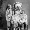 Crow Chief Plenty Coups (sitting on left) and group of Crow men. ca. 1900. Photo by Harris & Ewing.