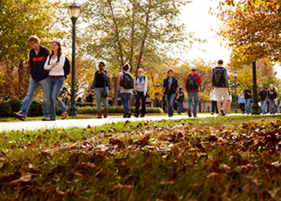 books autumn students walking campus 