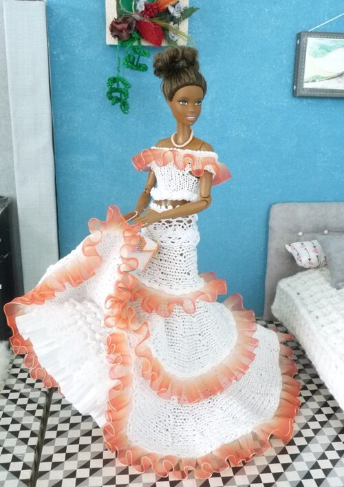 Barbie en modèle "Candide Tangerine"