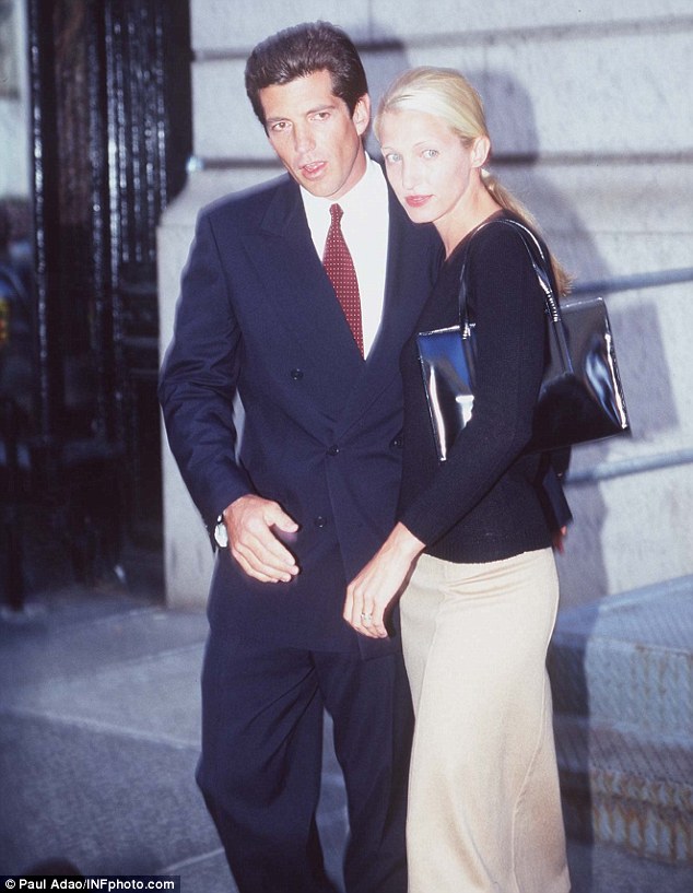 Tragic:  John F. Kennedy Jr and wife Carolyn Bessette are pictured here outside their New York City apartment soon after they wedded in secret in 1996