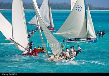 fleet-of-boats-racing-in-the-bahamian-sloop-regatta-georgetown-exumas-E45R5X