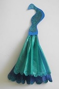 DIY Peacock embellishment, except I want to make this out of fabric.