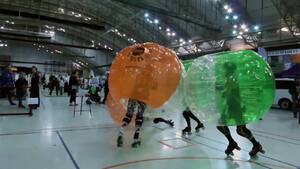 rainbow bubble soccer skating 