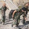 Lebanese soldiers cross rubble 173_0.jpg