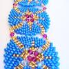 Bracelet tissé de perles de rocaille bleues 35€