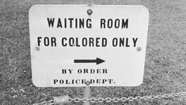 A sign in Jackson, Mississippi which reads 'Waiting Room For Colored Only by order Police Dept.'
