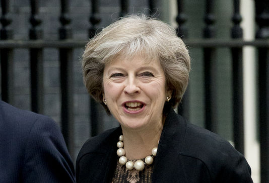 Matt Dunham / AP Theresa May.