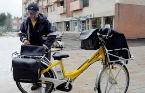 working bicycle postman city street 