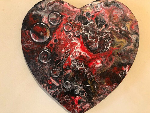 Red and black bubbles on heart