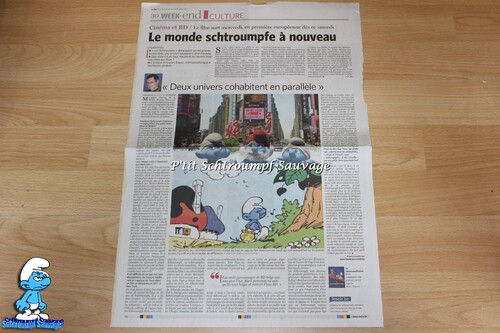 Journal Le Soir du 30 - 31/07/2011 : article "Le Monde schtroumpfe à nouveau"