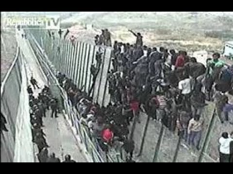 Plus de 600 migrants africains franchissent la barrière de Ceuta et  débarquent en Espagne - YouTube