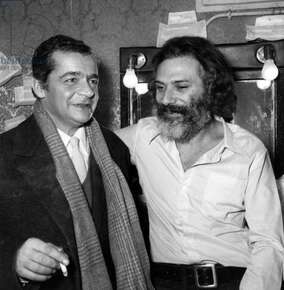 Serge Reggiani congratulating Georges Moustaki after his concert at Bobino,  Paris, 7 January 1970 (photo)