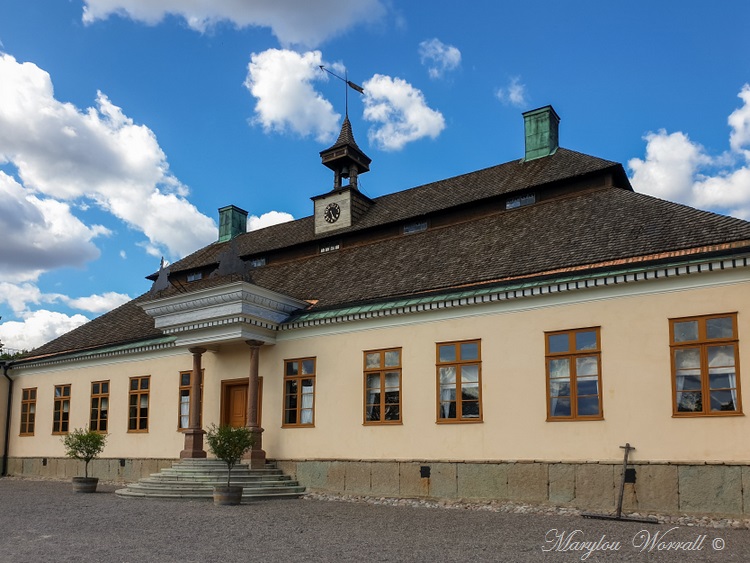 Suède : Écomusée Skansen Beffroi, Château d’eau, Halle, ferme Ekshärad, manoir de Skogaholm