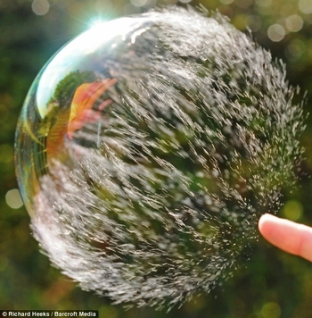slow-motion-bubble-popping-3844-1247506640-10