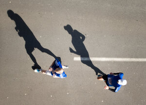 season marathon shadows runners running 