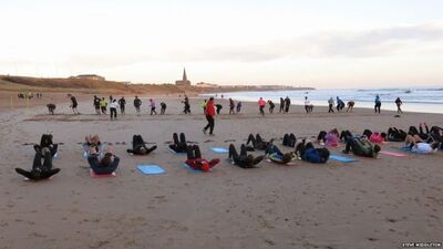 city street camp beach training in the sea