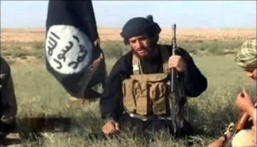 Capture d'écran d'une video postée le 8 juillet 2012 sur YouTube du porte-parole officiel de l'organisation EI, le syrien Abou Mohammed Al-Adnani