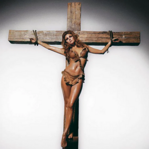 Terry O'Neil   Raquel Welch on the cross
