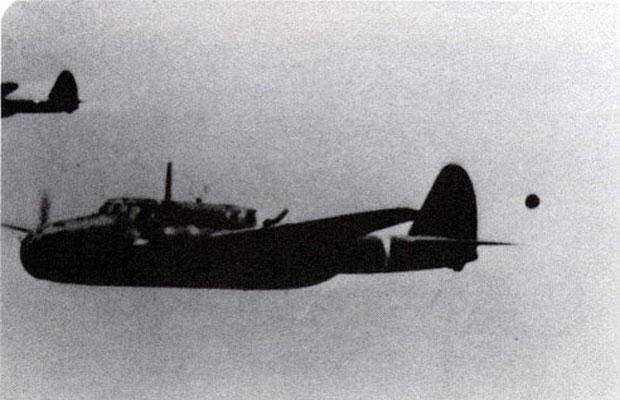 A Japanese Sally Bomber flies over the Japanese Sea in 1943 followed by a dark sphere