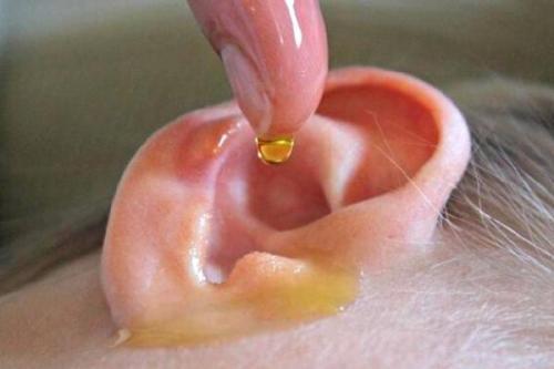 Oreille nettoyage huile doigt