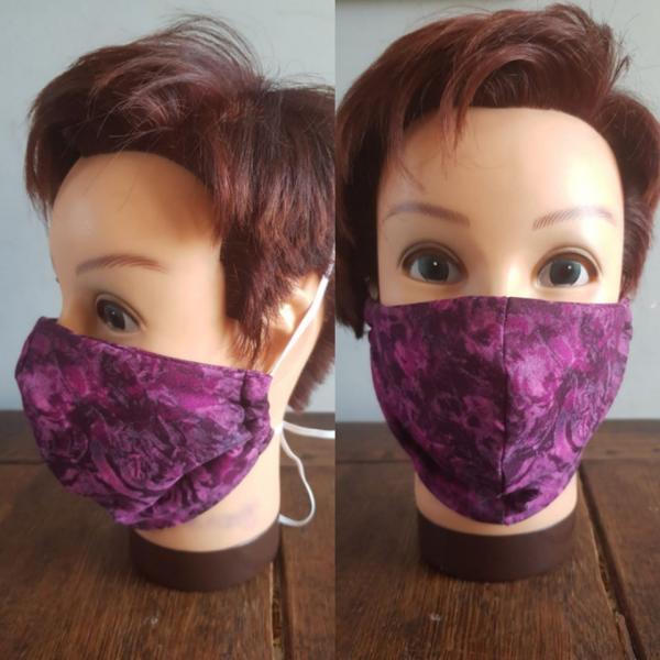 Olimbie confectionne des masques de protection ...