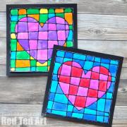 Black Glue Heart Art Project - Stained Glassed Heart Art. How beautiful is this art projects for kids this Valentine's Day? Would make a gorgeous gift too! #blackglue #heartart #valentinesday #artprojects #kidscrafts #art