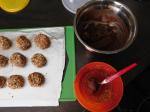 Truffes Azelia au pralin et éclats d’oranges confites