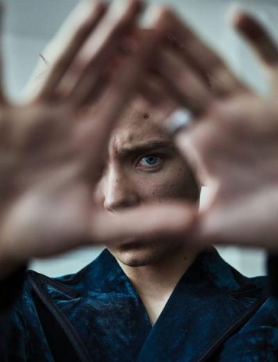 Asa Butterfield is another young English man who has to do the elites symbolism. Here is doing the Illuminati sign with his hands and eye in Schön! magazine.
