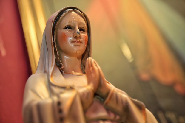 The Virgin Mary statue, which allegedly released oil from her eyes two years ago and now honey since the last three months, is located in a Pandan Indah house. ― Pictures by Saw Siow Feng