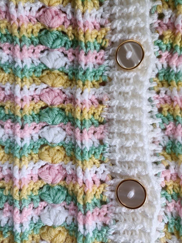 Une veste longue "sucre d'orge" au crochet...