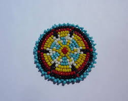 Rosette médaillon perlée